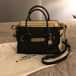Coach black and cream leather hand/shoulder bag.